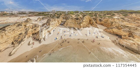 Panoramic drone picture over Praia do Prainha beach in Portuguese Algarve during daytime Panoramic drone picture over Praia do Prainha beach in Portuguese Algarve during daytime 117354445