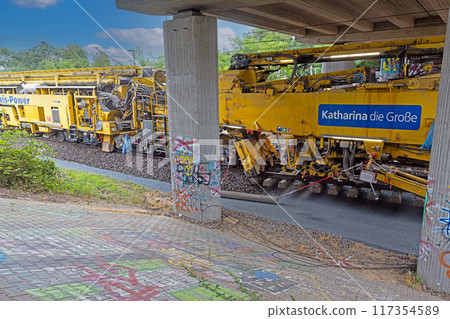Picture of a gigantic track construction train replacing ballast as part of the Riedbahn renovation in 2024 117354589