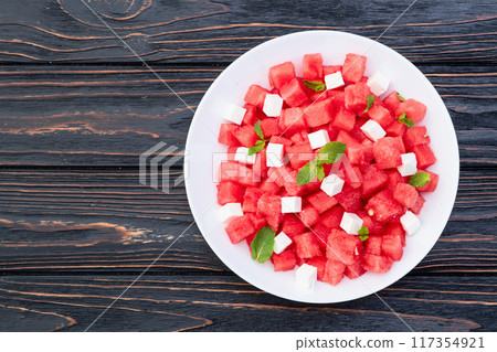 Summer watermelon salad with feta cheese and mint Summer watermelon salad with feta cheese and mint 117354921