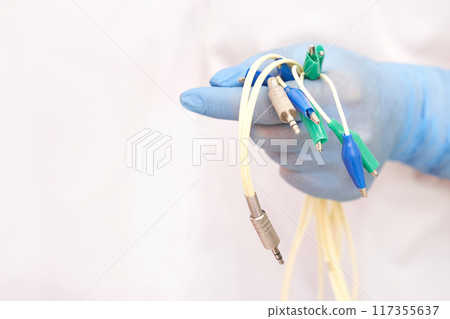 Body procedure. Professional dermatologist uses modern technology for laser Body procedure. Professional dermatologist uses modern technology for laser 117355637