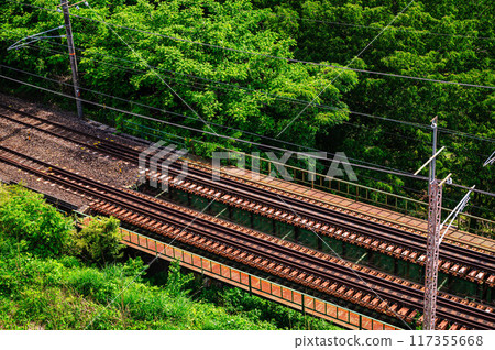 The railway bridge on the Chuo-Nishi Line running over the Nezame-no-Yoko 117355668
