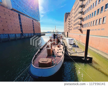 ship moored on canal 117356141