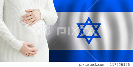 Demographics and pregnancy in Israel concept. Pretty pregnant woman belly  117356336