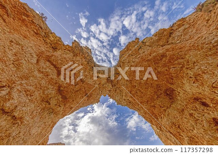there is a view from inside of the cave formation, there is a view from inside of the cave formation, 117357298