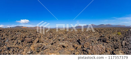 Panoramic view of the barren volcanic Timanfaya National Park on Lanzarote Panoramic view of the barren volcanic Timanfaya National Park on Lanzarote 117357379