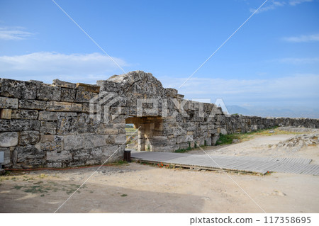 walls of the ancient ruins of limestone blocks. Ruins of the city of Hierapolis, Turkey. 117358695