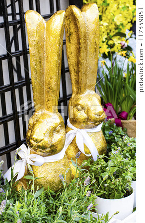 Two Golden Easter Bunnies 117359851