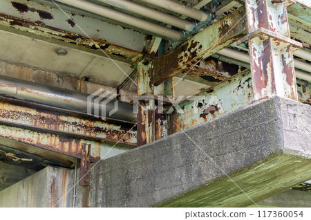 Corroded steel frame of bridge Corroded steel frame of bridge 117360054