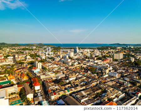 Aerial view of residential houses and driveways neighborhood during a fall sunset or sunrise time.Tightly packed homes.Top view over building houses in phuket thailand Aerial view of residential houses and driveways neighborhood during a fall sunset or sunrise time.Tightly packed homes.Top view over building houses in phuket thailand 117362014