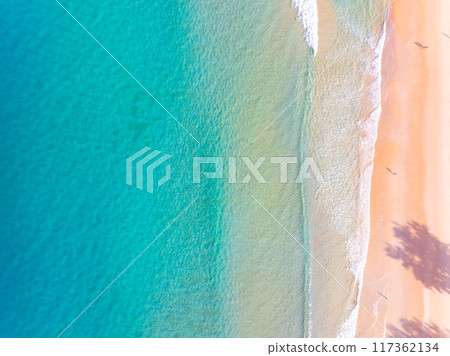 Beautiful sea beach and waves texture in sunny summer day background Beautiful sea beach and waves texture in sunny summer day background 117362134