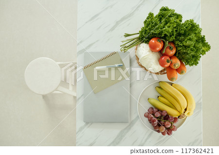 Laptop For Online Work In The Kitchen 117362421
