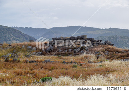 Antique ruins and limestone blocks in Hierapolis, Turkey. Ancient city. Antique ruins and limestone blocks in Hierapolis, Turkey. Ancient city. 117363248