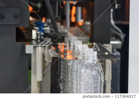 The drinking water bottle manufacturing process by blow mold machine. The drinking water bottle manufacturing process by blow mold machine. 117364017