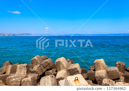 Concrete breakwaters at the coast of the Black sea. Protection for the shore structure against high waves 117364962