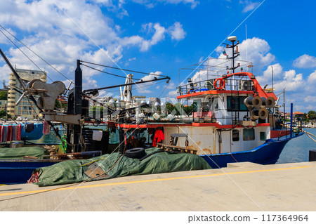 Fishing trawler in port in Pomorie, Bulgaria Fishing trawler in port in Pomorie, Bulgaria 117364964