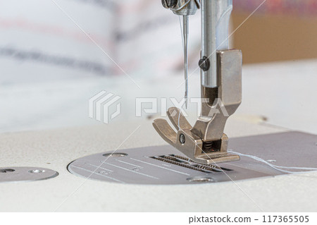 Sewing machine needle with thread and fabric Sewing machine needle with thread and fabric 117365505