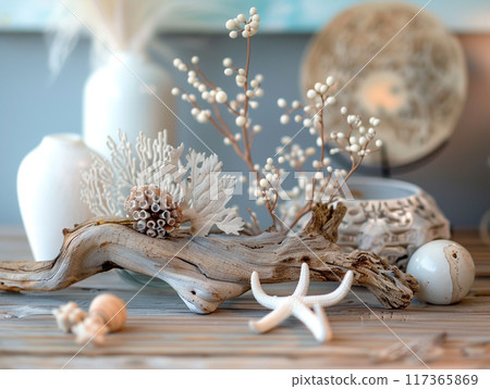 Tabletop decorations made from weathered wood and the collections of the remains of shells and sea corals. 117365869
