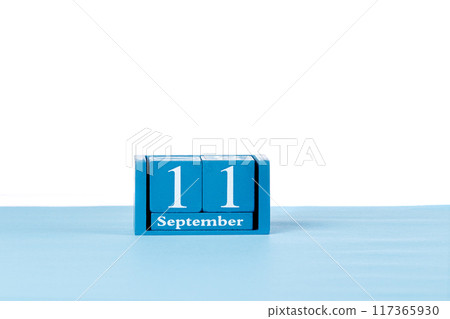 Wooden calendar September 11 on a white background 117365930