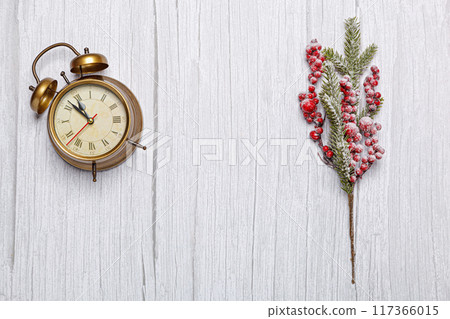 vintage christmas clock on wooden background vintage christmas clock on wooden background 117366015