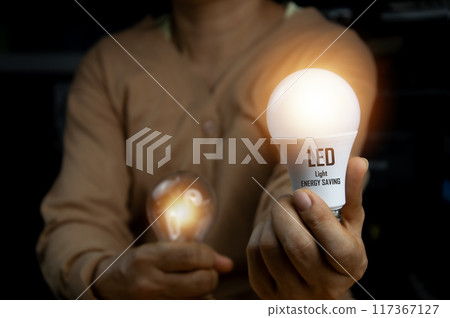 The concept of choosing LED light bulbs will help save energy. 117367127