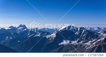 panoramic view of snowy high mountain peaks, Caucasus ridge. 117367260
