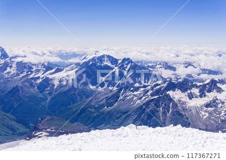 mountain landscape, view from highland snowfield to green valleys, view from Mount Elbrus to the Main Caucasian Range 117367271