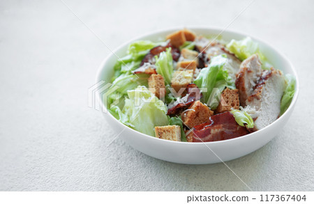 A bowl of Caesar salad A bowl of Caesar salad 117367404