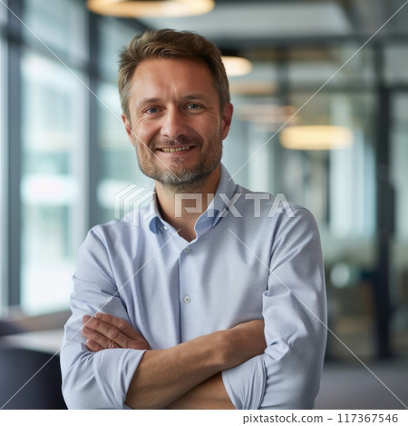 Portrait of a European businessman 40 years against the background of an office 117367546