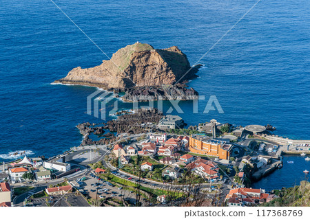 Rocky coast and cliffs of Porto Moniz on Madeira Island 117368769