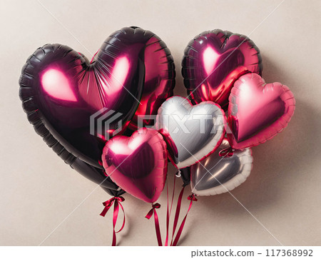 A bunch of heart shaped balloons in pink and silver 117368992