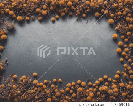 A large empty frame with a bunch of orange flowers in it 117369016