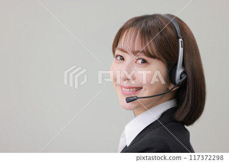 Young female operator_1 Young female operator_1 117372298