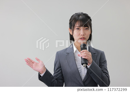 Reporter reporting on the situation at the scene_1 117372299