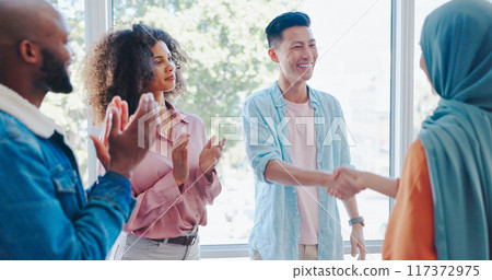 Handshake, success and diversity with business people in office for teamwork, support and thank you. Celebration, community and meeting with employees and applause for motivation, welcome and deal Handshake, success and diversity with business people in office for teamwork, support and thank you. Celebration, community and meeting with employees and applause for motivation, welcome and deal 117372975