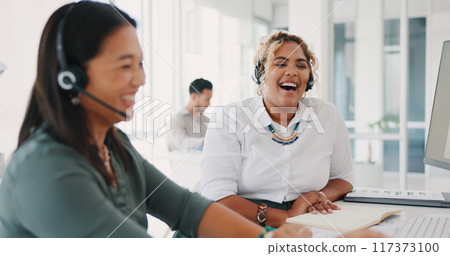 Business people, call center and laughing in customer service, support or telemarketing together at office. Happy and friendly women, consultant or agent in funny joke, meme or online communication 117373100
