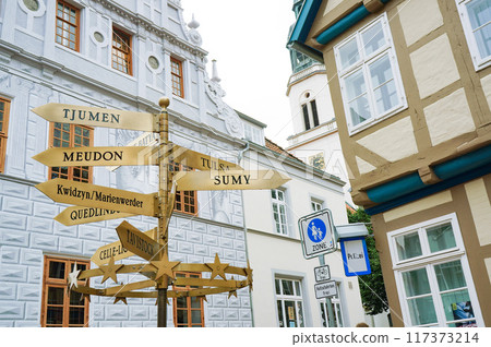Signs pointing in various directions Signs pointing in various directions 117373214