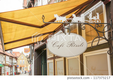 Store signs found at travel destinations 117373217