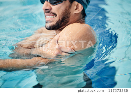 Man in swimming pool, athlete with injury and shoulder pain, fitness with sport accident and muscle ache during workout. Water sports, stroke mistake and swimmer, exercise and problem with arm 117373286
