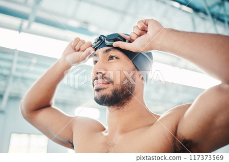 Swimming athlete, man and start race, fitness and exercise at pool, motivation and active lifestyle. Water sports, determination and face with workout, training and health with wellness in sport Swimming athlete, man and start race, fitness and exercise at pool, motivation and active lifestyle. Water sports, determination and face with workout, training and health with wellness in sport 117373569