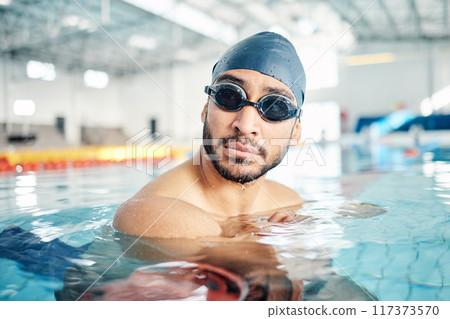 Man, face or swimmer with pool cap, goggles or gear and sports vision, ideas or mindset in Asian water competition. Training, workout or exercise for swimming athlete with fitness goals or healthcare 117373570