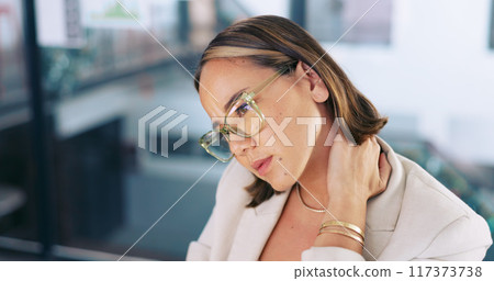 Tired, business woman and neck pain or overworked employee in office. Serious, burnout stress and space with a asian professional with hand on muscle for fatigue or frustrated, tension or bad posture 117373738