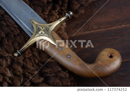 Saber Sword on fur, 17th century. Poland, Lithuania, Hungary, Ukraine. 117374252