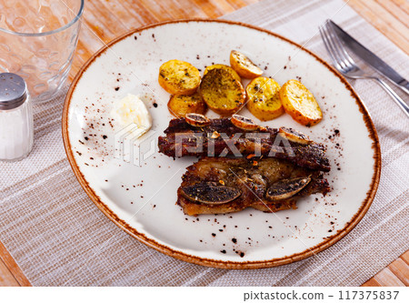 Grill dish in Spain churrasco de ternera, grilled beef spare ribs Grill dish in Spain churrasco de ternera, grilled beef spare ribs 117375837