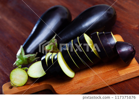 Fresh eggplants with chopped slices Fresh eggplants with chopped slices 117375876