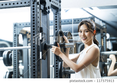 Sports gym, training gym, woman, muscle training, portrait Sports gym, training gym, woman, muscle training, portrait 117375913
