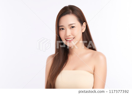 Beautiful young asian woman with clean fresh skin on white background, Face care, Facial treatment, Cosmetology, beauty and spa, Asian women portrait. Beautiful young asian woman with clean fresh skin on white background, Face care, Facial treatment, Cosmetology, beauty and spa, Asian women portrait. 117377392