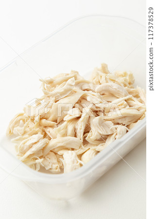 Boiled and split chicken breast on white background Boiled and split chicken breast on white background 117378529