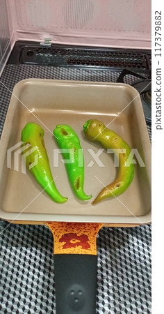 Grilled Manganji peppers Grilled Manganji peppers 117379882
