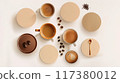 Flat lay of various coffee beverages, beans, and powdered ingredients on a white background, showcasing diverse coffee preparations.. 117380012