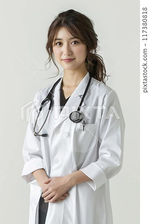 A woman in a white coat 117380818